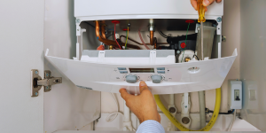 combi boiler being installed in a house